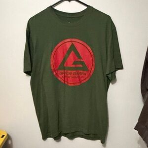 Green Short Sleeve Tee with Red Emblem